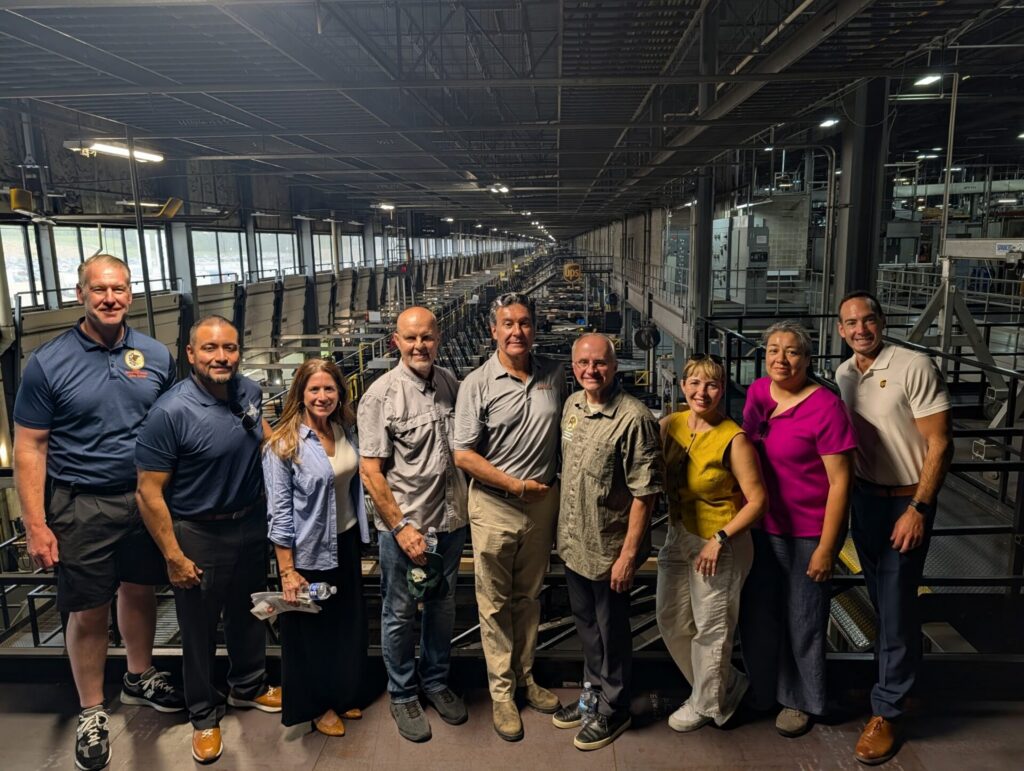 Group stands inside the impressive intermodal facility at Willow Springs.